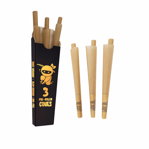 A pack of RAW rolling papers with a hand-rolled cigarette.