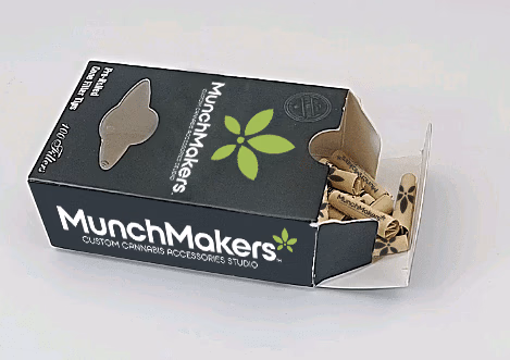 A person holding a lit, hand-rolled cigarette using RAW papers.
